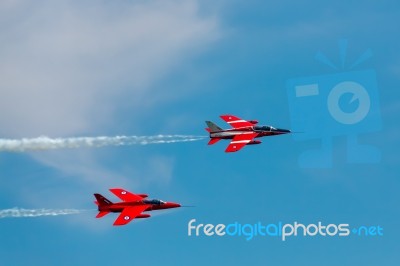 Red Gnat Display Team At Airbourne Stock Photo