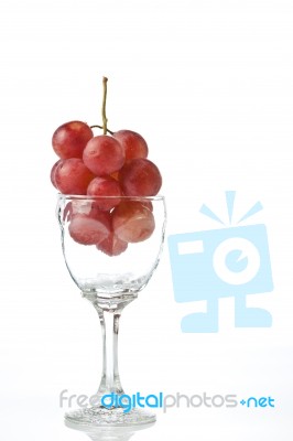 Red Grapes In A Glass Stock Photo