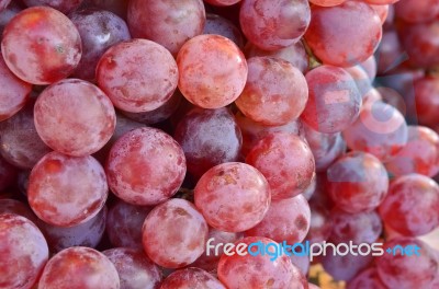 Red Grapes In A Market Stock Photo