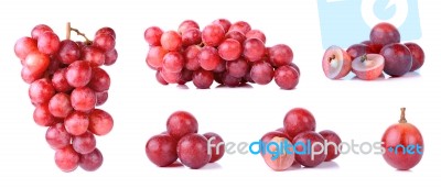 Red Grapes Isolated On A White Background Stock Photo