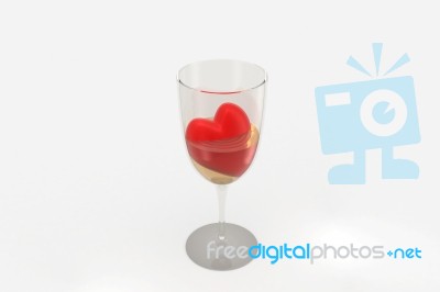 Red Heart Dug In Wine Glass Stock Image