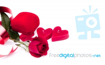 Red Heart Shaped Candles And Rose Stock Photo