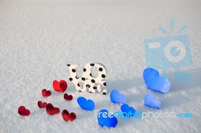 Red Hearts And Love On Snow Stock Photo