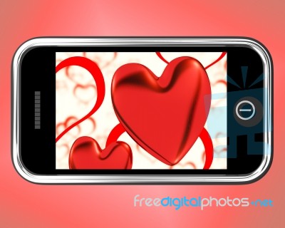 Red Hearts On Mobile Phone Stock Image