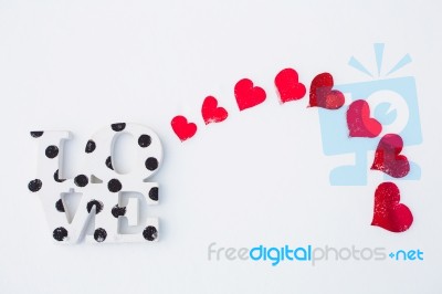 Red Hearts On White Snow Stock Photo