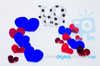 Red Hearts On White Snow Stock Photo