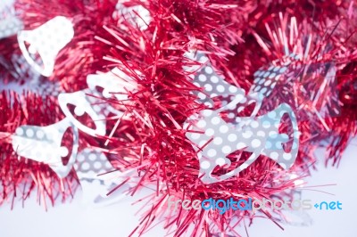 Red Holiday Decoration Ribbon On White Background Stock Photo