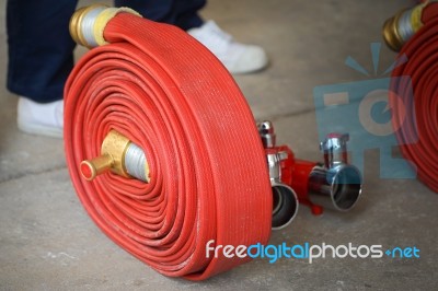 Red Hose Fire Stock Photo