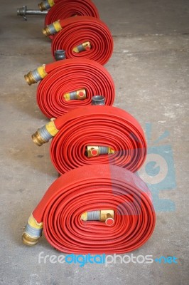 Red Hose Fire Stock Photo