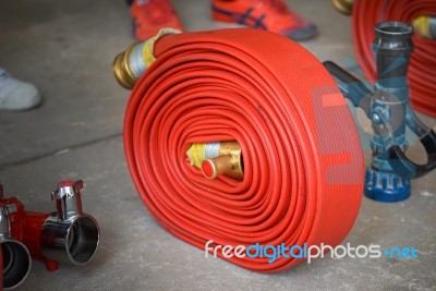 Red Hose Fire Stock Photo