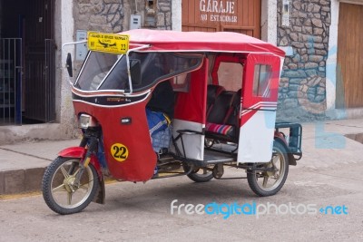 Red Motorcycle Taxi Stock Photo