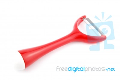 Red Peeler On White Stock Photo