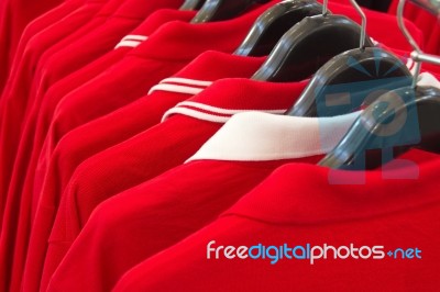 Red Polo Shirts Stock Photo