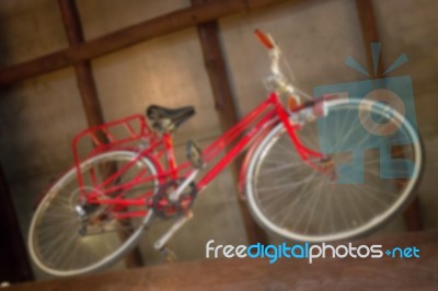 Red Retro Bicycle Showed On The Ceiling Stock Photo