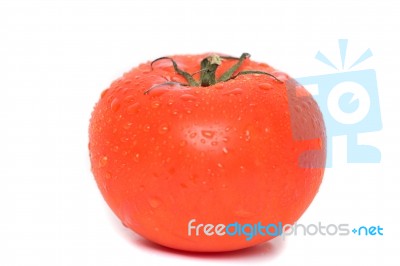 Red Tomato With Water Droplets Stock Photo