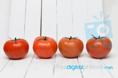 Red Tomatoes Fruits Isolated On White Stock Photo