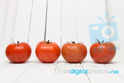 Red Tomatoes Fruits Isolated On White Stock Photo