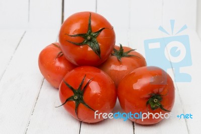 Red Tomatoes Fruits Isolated On White Stock Photo