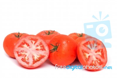 Red Tomatoes With Water Droplets Stock Photo