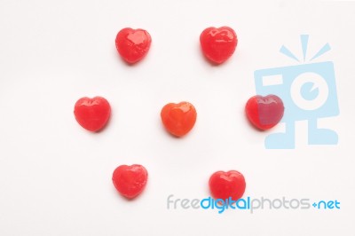 Red Valentine's Day Heart Shape Candy Pattern On Empty White Paper Background. Love Concept. Colorful Hipster Style. Knolling Top View Stock Photo