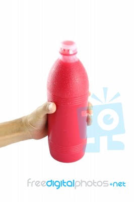 Red Water Bottle In Cover Hand On White Background Stock Photo