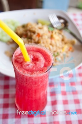 Red Watermelon Juice And Tofu Vegetable Fried Rice Stock Photo