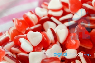 Red White Heart Shape Jelly Candy Bonbon Snack Group. Sweet For Valentines Day Background Stock Photo