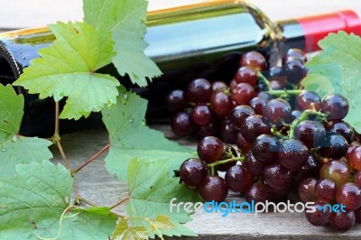 Red Wine And Grapes Stock Photo