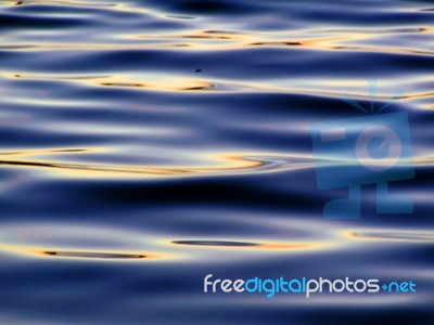 Reflection In Waves Stock Photo