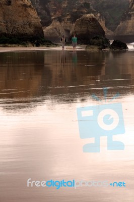 Reflection On Wet Sand Stock Photo