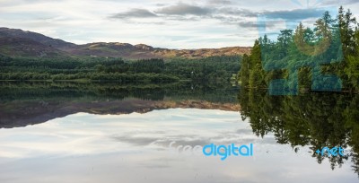 Reflections In Loch Alvie Stock Photo