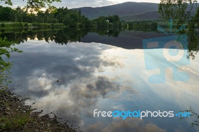 Reflections In Loch Alvie Stock Photo