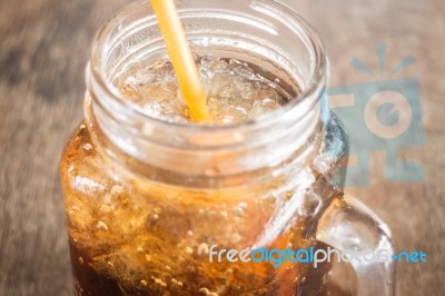 Refreshing Brown Soda With Ice Stock Photo