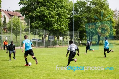 Refugees Playing Soccer Stock Photo