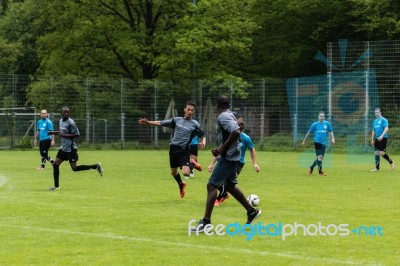 Refugees Playing Soccer Stock Photo