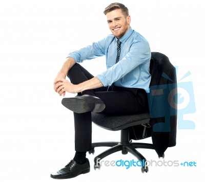 Relaxed Businessman Posing Casually Stock Photo