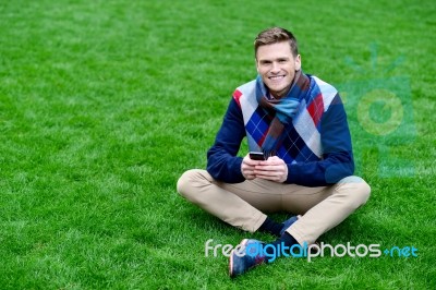 Relaxed Young Guy Enjoying His Day Out Stock Photo