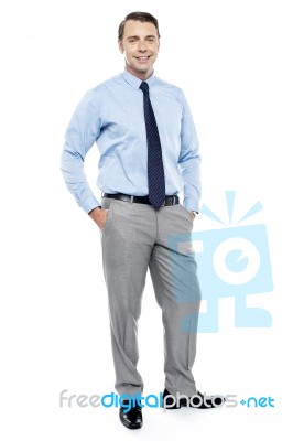 Relaxed Young Manager Posing In Style Stock Photo