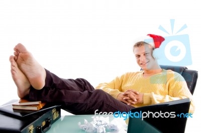 Relaxing Male Wearing Christmas Hat Stock Photo