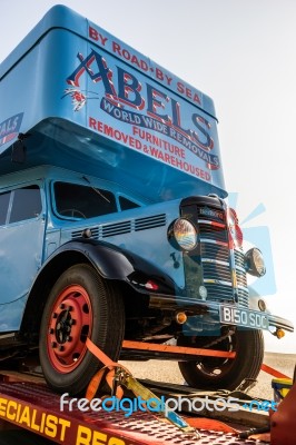 Removal Truck On A Trailer In Brighton Stock Photo