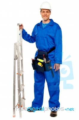 Repairman Holding Step Ladder Stock Photo