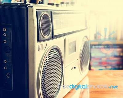 Retro Radio Cassette Stereo Recorder On Wooden Desk Stock Photo