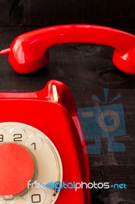 Retro Vintage Red Landline Unhang On Wooden Background Stock Photo