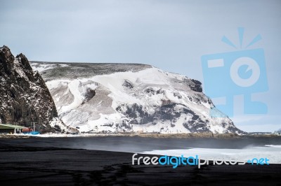 Reynisfjara Volcanic Beach In Winter Stock Photo