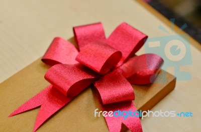 Ribbon Gift  Of Extra Time Stock Photo