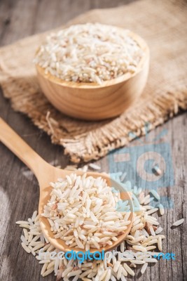 Rice Berry Or Rice Berries In Wooden Spoon Stock Photo