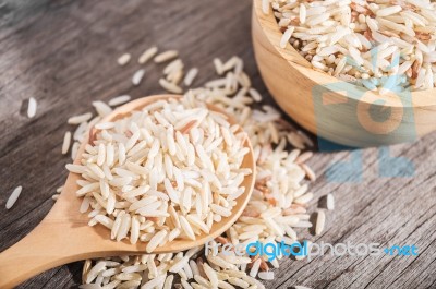 Rice Berry Or Rice Berries In Wooden Spoon Stock Photo