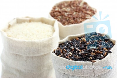 Rice In Small Burlap Sack Stock Photo