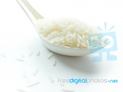 Rice On Spoon Stock Photo