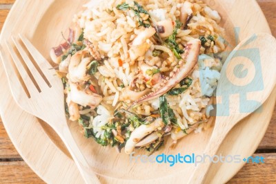 Rice Topped With Stir-fried Squid Basil (thai Food) Stock Photo